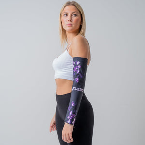 Athlete achieving peak performance in sports with FlexoGear's Compression Arm Sleeve.