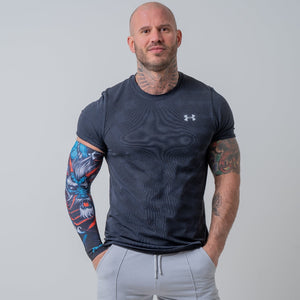 Athlete confidently flaunting FlexoGear's Compression Arm Sleeve as a stylish athleisure accessory